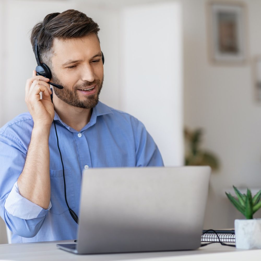 hotline-operator-portrait-of-call-center-employee-wearing-headset-at-workplace-in-office.jpg hotline-operator-portrait-of-call-center-employee-wearing-headset-at-workplace-in-office.jpg